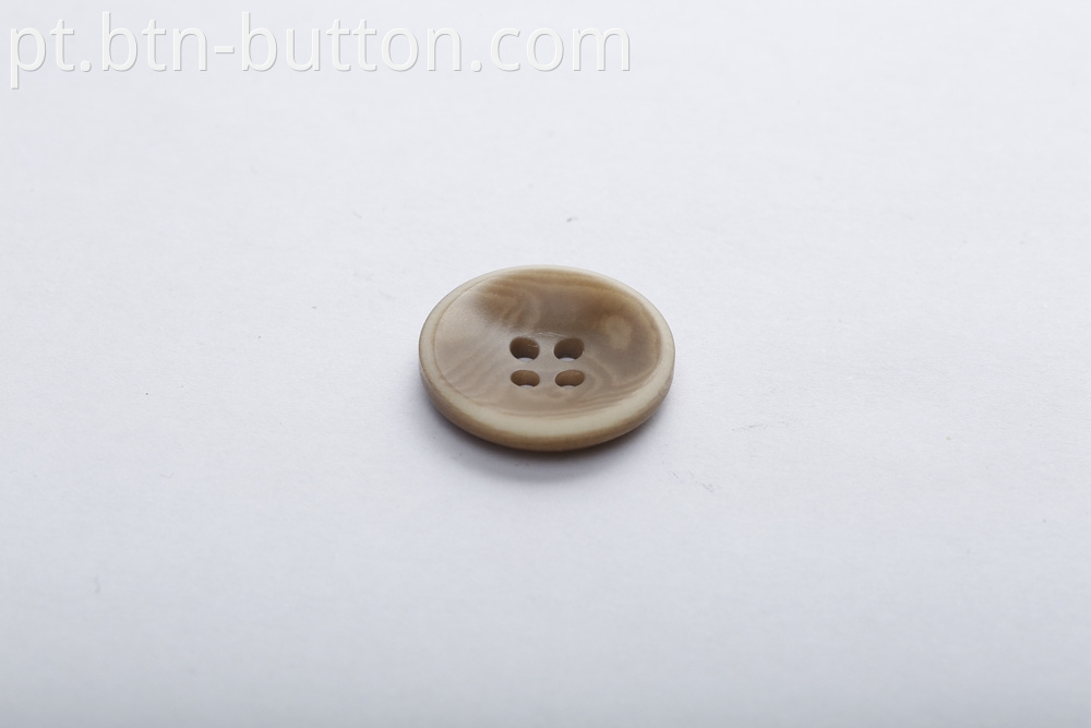 Four-hole fruit buttons for suits
